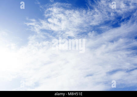 small clouds in the blue sky. Evening sky with lots small clouds - natural background Stock Photo