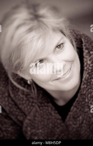 Portrait of smiling young woman. Stock Photo