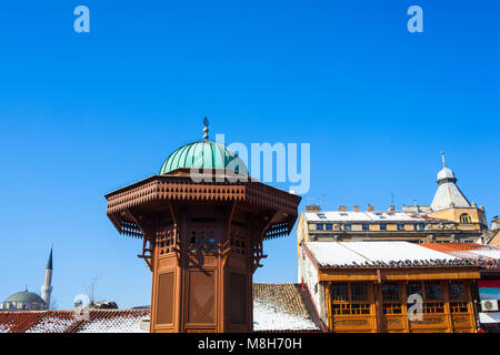 The Sebilj is a pseudo-Ottoman-style wooden fountain (sebil) in the centre of Bascarsija square in Sarajevo Stock Photo