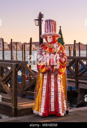 People in beautiful fancy dress costumes and mask at the Venice Carnival, Carnivale di Venezia, Veneto, Italy Stock Photo