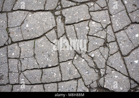 Cracked asphalt. Old asphalt background Asphalt pattern Stock Photo