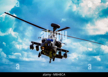 An Apache helicopter performs a short set of manoeuvres for Prince Henry of Wales KCVO and new graduates at the Museum of Army Flying, Middle Wallop on Friday 16 March, 2018. Stock Photo