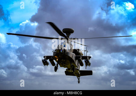 An Apache helicopter performs a short set of manoeuvres for Prince Henry of Wales KCVO and new graduates at the Museum of Army Flying, Middle Wallop on Friday 16 March, 2018. Stock Photo