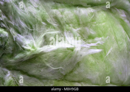 Mineral wool background roof thermal white yellow . Stock Photo