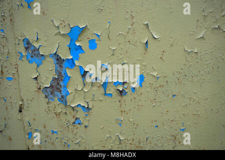 Old cracked paint pattern on rusty background. Peeling paint. Pattern of blue grunge material. Damaged paint. Scratched old plate Stock Photo