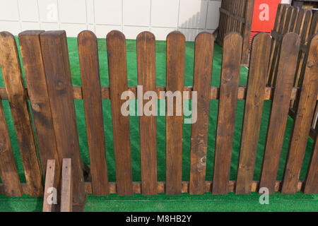 The White Fence with The Artificial Grass Stock Photo
