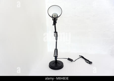 Vintage black desk lamp isolated on white Stock Photo