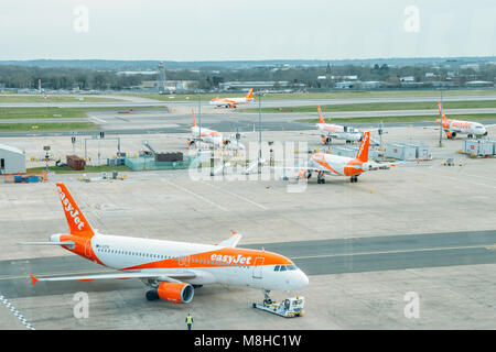 London Gatwick, March 15th, 2018: Airbus A320 airplanes belonging to low cost airliner, easyJet, on tarmac at London Gatwick's North Terminal Stock Photo