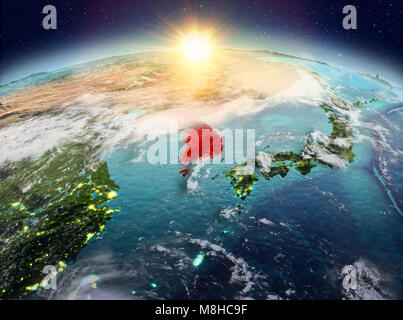Satellite night view of South Korea highlighted in red on planet Earth ...