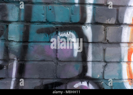 Old brick wall from a multi-colored brick Stock Photo
