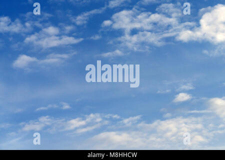 Blue sky with parallel white clouds summer Stock Photo