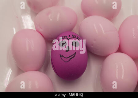 Funny easter eggs with drawn faces depicting various emotions Stock Photo