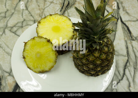 Pineapple collection. Whole and sliced pineapple isolated on white background Stock Photo