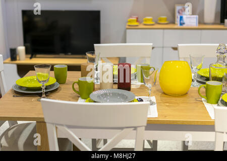 Beautifully decorated table in the kitchen. Stock Photo