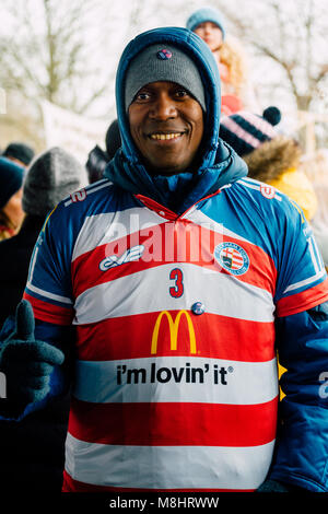 Peckham Town founder and head coach Bryan Hall in support of Dulwich Hamlet Football Club at the end of their march from Goose Green at the DHFC home in Champion Hill, East Dulwich, London, Saturday 17th March 2018. Thousands of fans came out in support of Dulwich Hamlet Football Club who have been evicted from their grounds by property developer Meadows, after Meadows were refused planning permission to redevelop the site. Credit: Tom Leighton/Alamy Live News Stock Photo