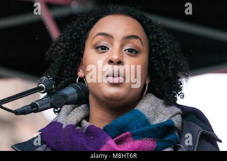London, UK. 17th March, 2018. Huda Elmi, Labour Party black activist, addresses the March Against Racism. The March Against Racism is organised by Stand Up To Racism to call on the Government to enact the Dubs Amendment, requiring it to act ‘as soon as possible’ to relocate and support unaccompanied refugee children in Europe, and to assist those fleeing war and persecution. Credit: Mark Kerrison/Alamy Live News Stock Photo
