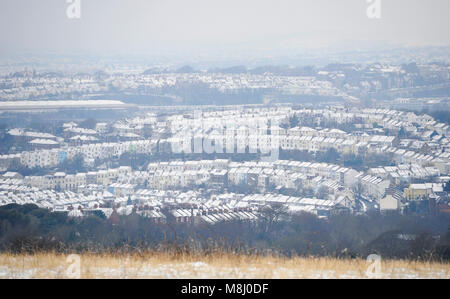 Brighton UK 18th March 2018 - Snow covered rooftops in Brighton this morning as a mini Beast from the East sweeps across Britain with more cold weather forecast for the next few days Credit: Simon Dack/Alamy Live News Stock Photo
