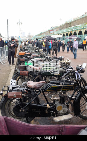 Brighton UK 18th March 2018  - Over 300 veteran motorcycles and their riders at the finish of the 79th London to Brighton Pioneer Run for veteran motorcycles .The Sunbeam Motorcycle Club has organised the London to Brighton run for veteran motorcycles since 1930 and is open to all motor cycles and tricycles manufactured before 1915. Credit: Simon Dack/Alamy Live News Stock Photo