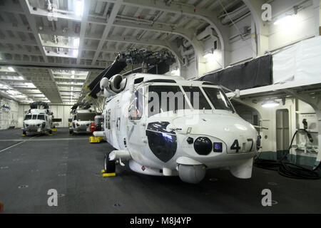Inside Helicopter carrier Izumo's hangar bay Stock Photo
