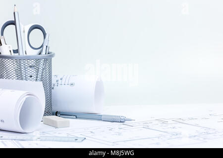 workplace of architect. engineering and drawing tools, construction blueprints on wooden desk  Stock Photo