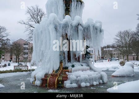 Frozen fountain at Fountain Park, Paisley, Scotland during ‘Beast from the East’ bad weather system. Stock Photo