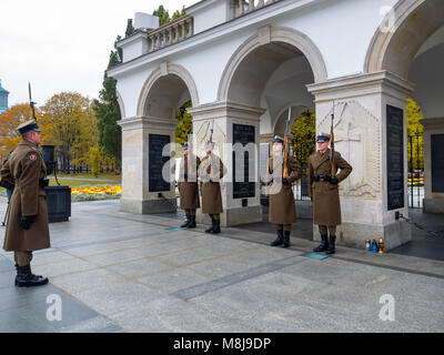 Tomb of the Unknown Soldier and the Honor Guard, since 1925. Part of the Saxon Palace at Pilsudski Square. WARSAW, POLAND - OCTOBER 30, 2014 Stock Photo
