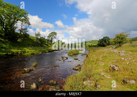 The beautiful River Wharfe in Wharfedale near Grassington, North Yorkshire, Yorkshire Dales National Park, England, on a sunny early autumn day