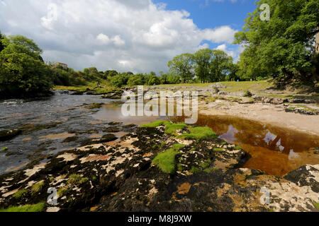 The beautiful River Wharfe in Wharfedale near Grassington, North Yorkshire, Yorkshire Dales National Park, England, on a sunny early autumn day