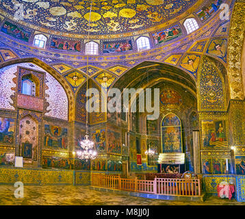 ISFAHAN, IRAN - OCTOBER 20,2017: Panorama of Armenian Orthodox Bethlehem Church with altar and side walls decorated with golden patterns and colorfed  Stock Photo
