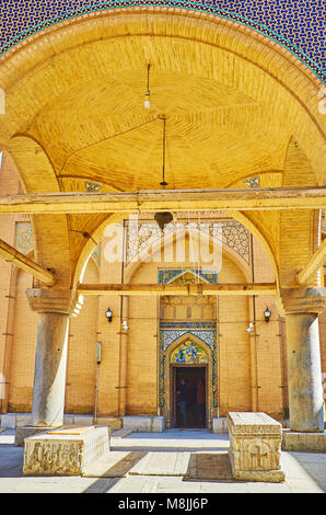 ISFAHAN, IRAN - OCTOBER 20,2017: The beautiful pavilion with stone columns is the ground level of Vank Cathedral's bell tower, containing the medieval Stock Photo