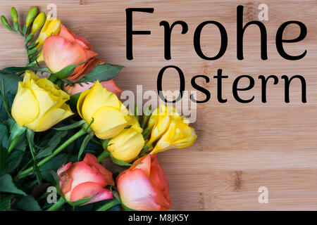 german inscription merry easter holiday on wooden background Stock Photo