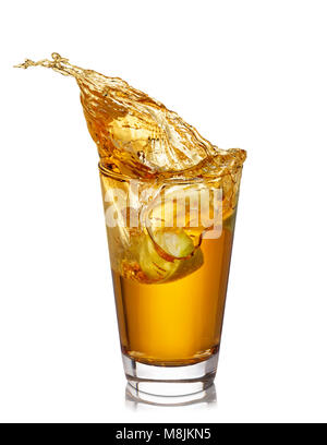 glass of splashing apple juice Stock Photo