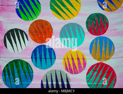 Hand painted striped circles on light purple wood background Stock Photo