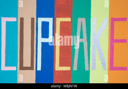 Hand painted cupcake text on painted striped background Stock Photo