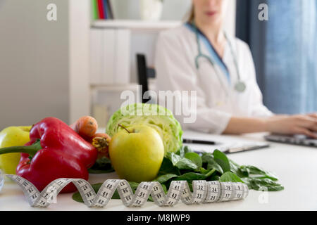 Vegetable diet nutrition and medication concept. Nutritionist working.Nutritionists workplace Stock Photo