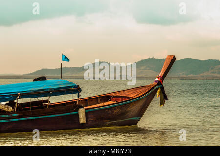 Typical Thai bow boat in the sea of Andaman Phang Nga bay Thailand Stock Photo