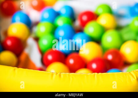 Close up blurred ball pit for kids Stock Photo
