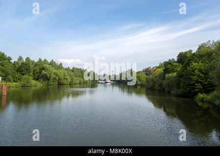 Scenic Main River with calm waters, lined with trees, near bamberg Germany. Stock Photo
