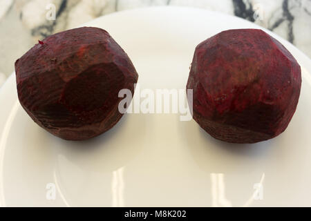 beetroot peeled on white background Stock Photo