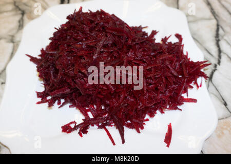 A bowl of boiled beets grated. View from above Stock Photo