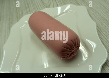 Sliced boiled ham sausage isolated on white background, top view Stock Photo