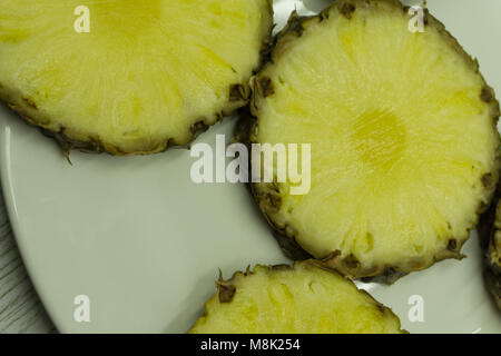 Canned pineapple plate product ripe round sliced Stock Photo