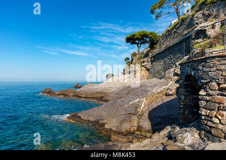 View of Mediterranean sea an rocks along coastline of Recco - small town in Liguria, Italy. Stock Photo