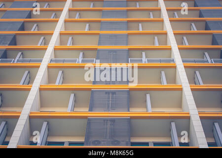 Abstract angle bottom view of front side of residential architecture buildings. Stock Photo