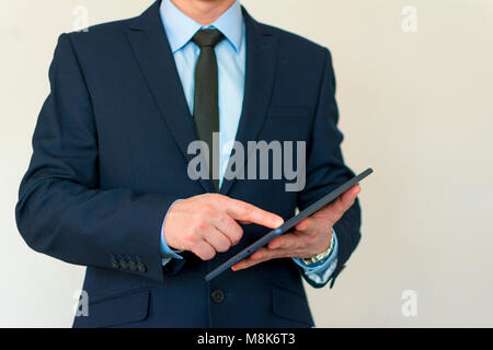 The businessman who operates a tablet PC Stock Photo