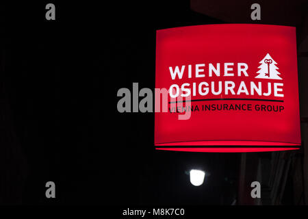 SARAJEVO, BOSNIA - FEBRUARY 16, 2018: Wiener Insurance logo on their main agency in Sarajevo, taken at night. Wiener Insurance, aprt of Vienna Insuran Stock Photo
