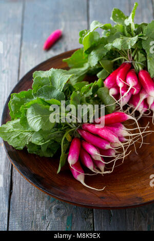 radish on a wooden table Stock Photo