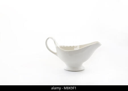 white porcelain sauceboat cup isolated on white background. Stock Photo