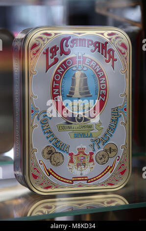 Souvenir tin in the window of La Campana cake shop in Seville Stock Photo