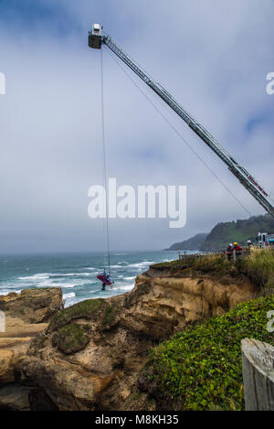 Newport fire department conducts a rescue drill at Devil's Punchbowl State Natural Area.  Otter Rock, Oregon
